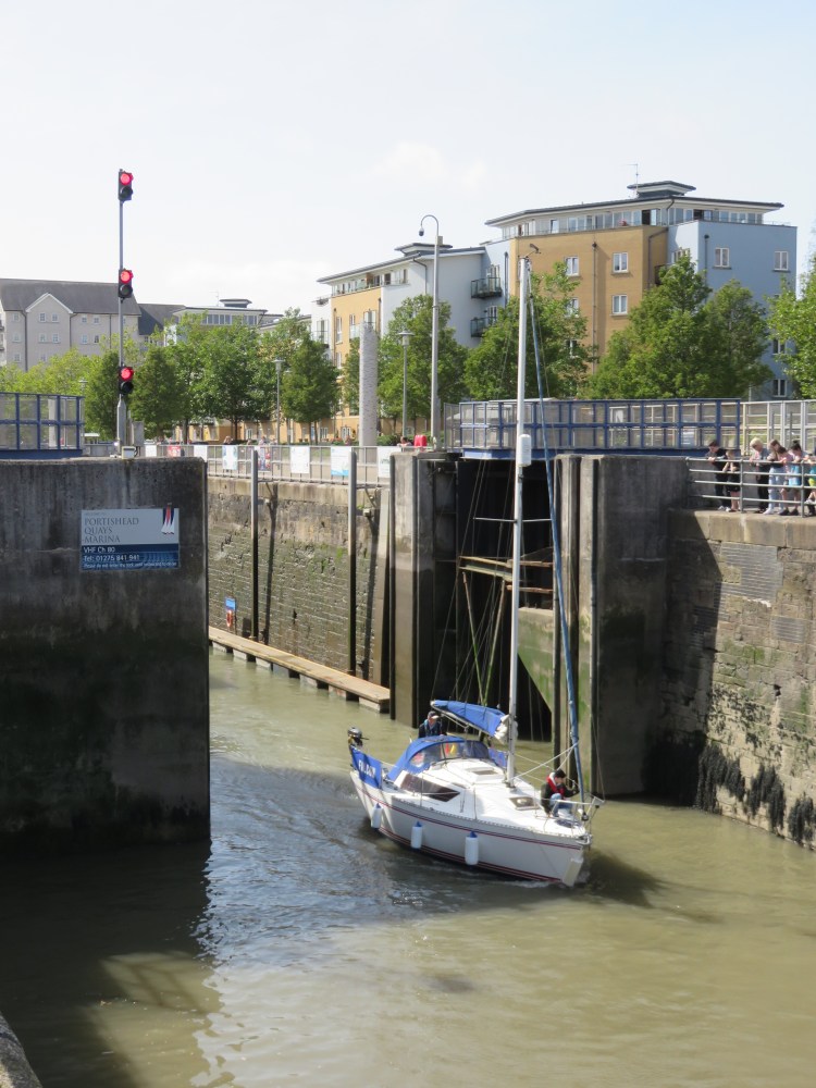 A boat emerges from the lock