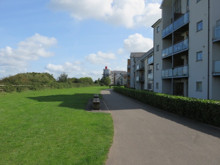 The all-weather route runs in front of the flats