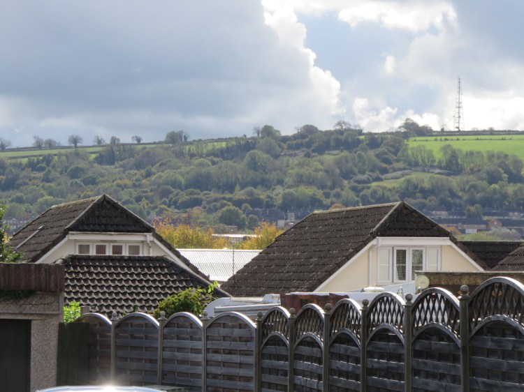 Dundry hill rises in the distance