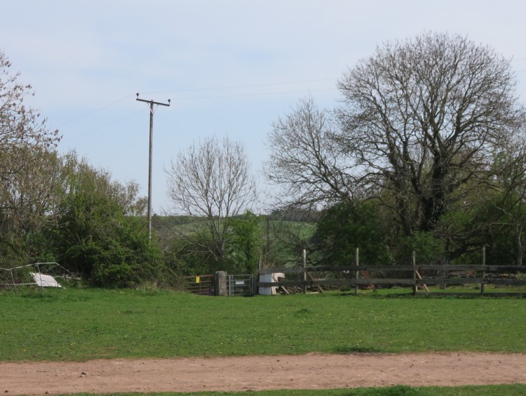 The gate leading out of the dirt bike area